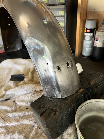wet sand stainless steel fender
