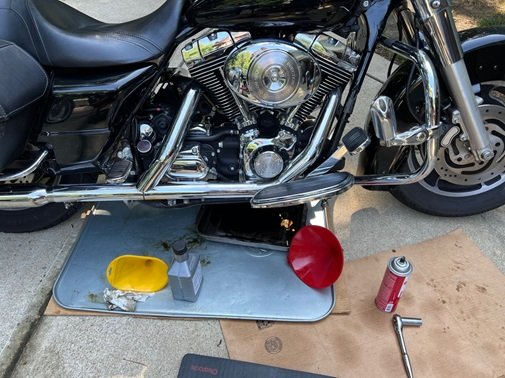 Harley 3 hole oil change engine transmission and primary DIY 3 hole oil change