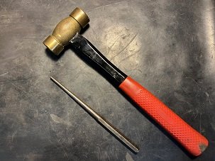 install bushing into fork slider with drift and hammer replace fork bushings