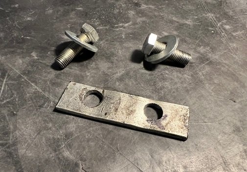 drilled holes in metal bracket