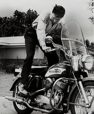 Elvis Presley kick-starting his Harley-Davidson Model K