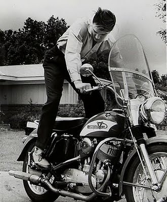Elvis Presley kick-starting his Harley Model K Elvis Presley on his Harley-Davidson Model K