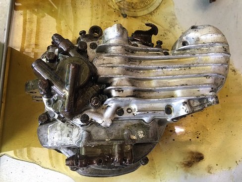 old Harley engine teardown and inspection Harley engine soaking in oil