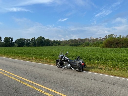motorcycle parked on a quiet country road 2005 Harley Road King review by owner