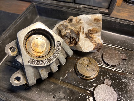 Norton Commando brake caliper overhaul