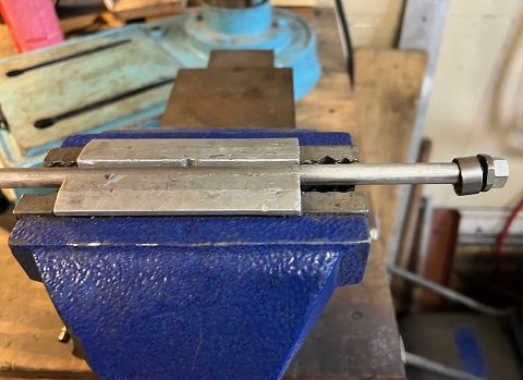 roll pin, valve, washer and nut Norton Commando fork rod Norton Commando fork assembly sequence