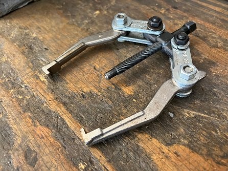 two jaw gear puller how to remove sprocket shaft bearing